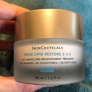 SkinCeuticals Triple Lipid Restore. Opened and used once to test! 48ml.